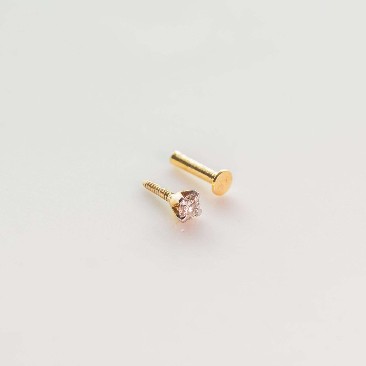 0.10 CT Diamond Stud in 18 CT Gold Claw Shape-0