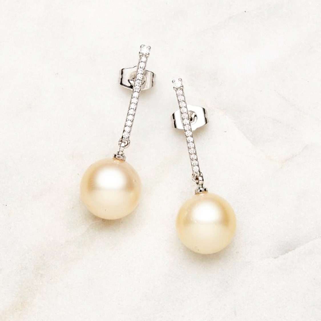 South Sea white pearl dangling earrings with cream undertone